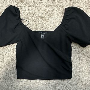 Black cross over top